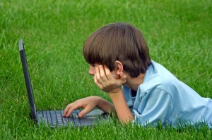 boy using computer